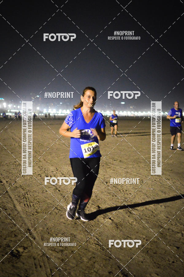 Buy your photos of the eventJovem Pan Night Run Santos on Fotop