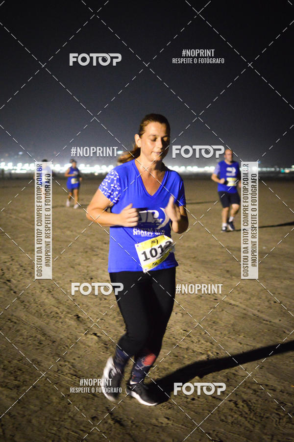 Buy your photos of the eventJovem Pan Night Run Santos on Fotop