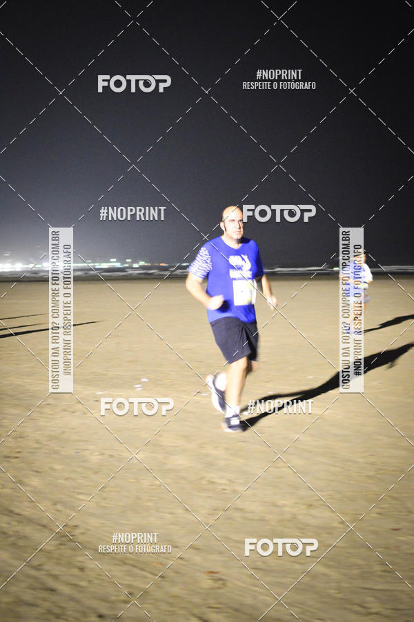 Buy your photos of the eventJovem Pan Night Run Santos on Fotop