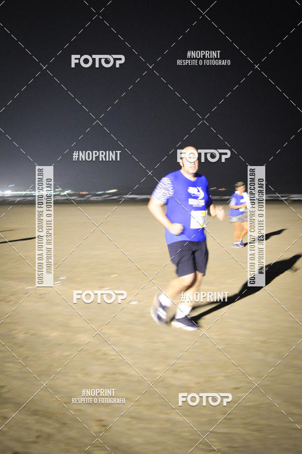 Buy your photos of the eventJovem Pan Night Run Santos on Fotop