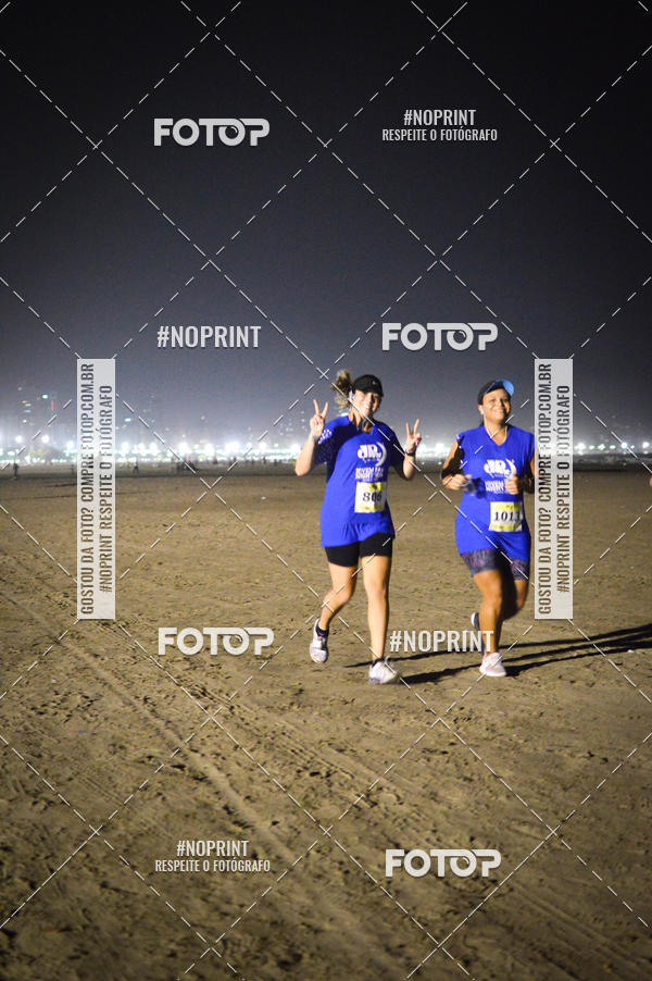 Buy your photos of the eventJovem Pan Night Run Santos on Fotop
