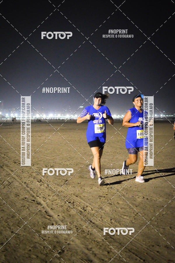 Buy your photos of the eventJovem Pan Night Run Santos on Fotop