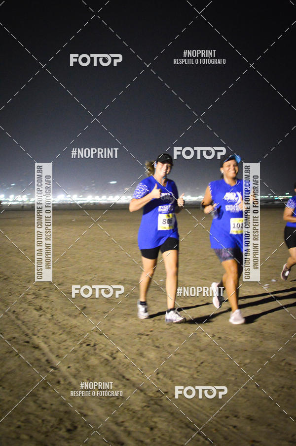 Buy your photos of the eventJovem Pan Night Run Santos on Fotop