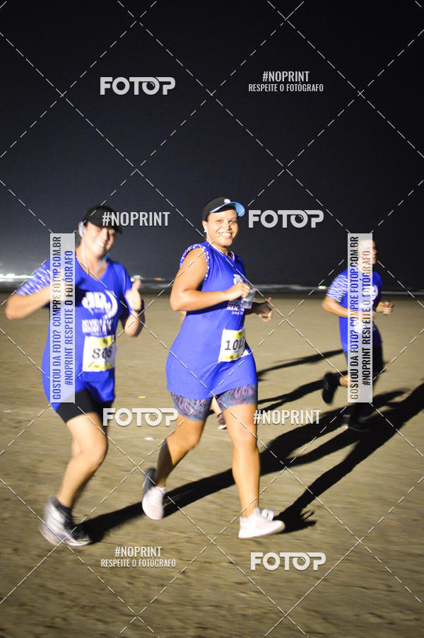 Buy your photos of the eventJovem Pan Night Run Santos on Fotop