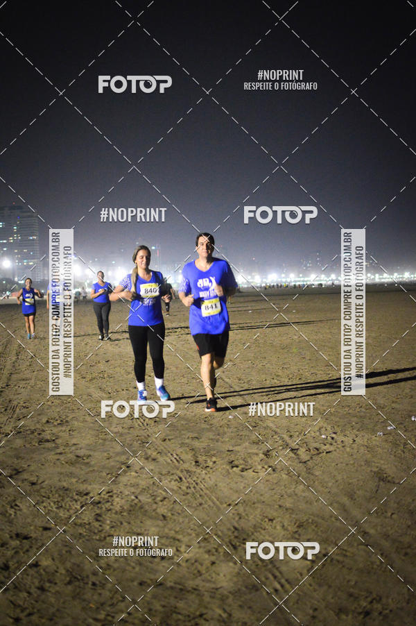Buy your photos of the eventJovem Pan Night Run Santos on Fotop