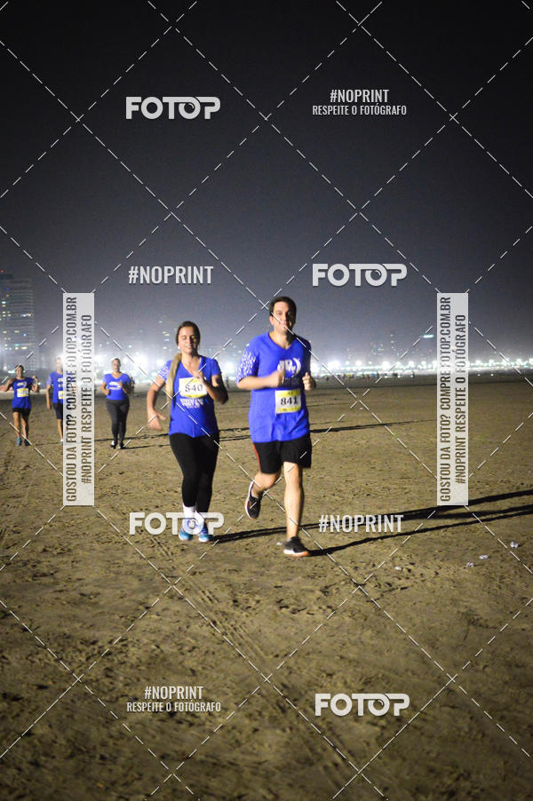 Buy your photos of the eventJovem Pan Night Run Santos on Fotop