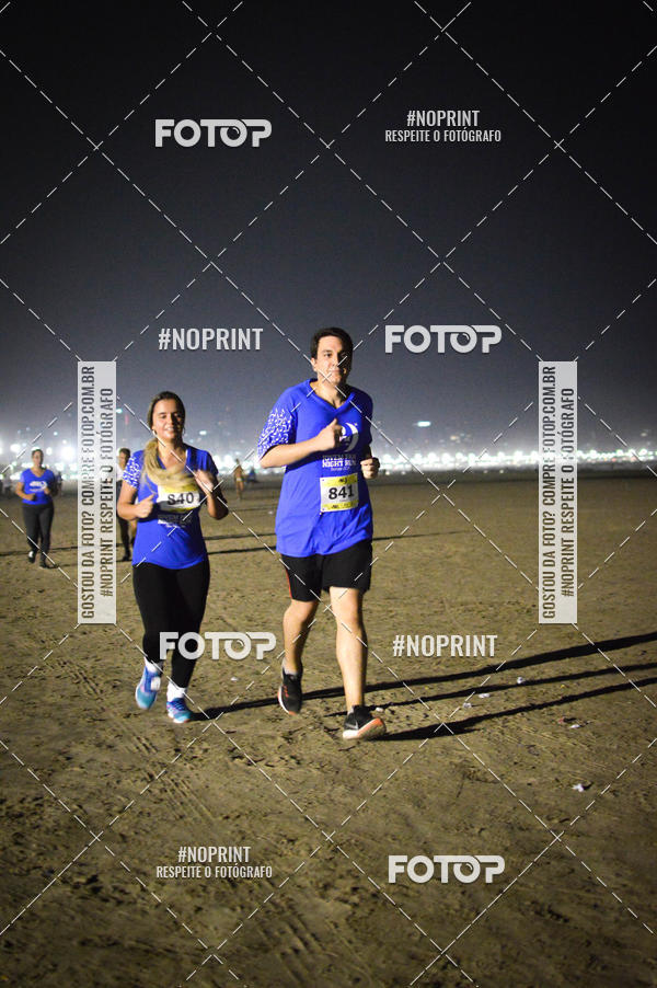 Buy your photos of the eventJovem Pan Night Run Santos on Fotop