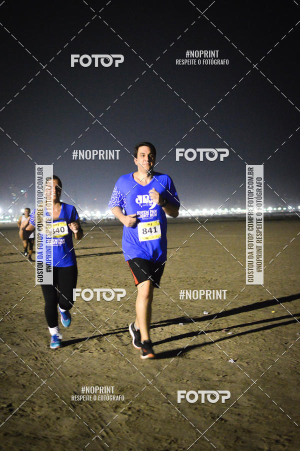 Buy your photos of the eventJovem Pan Night Run Santos on Fotop