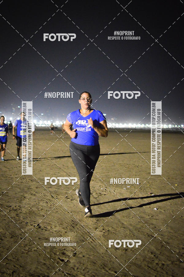 Buy your photos of the eventJovem Pan Night Run Santos on Fotop