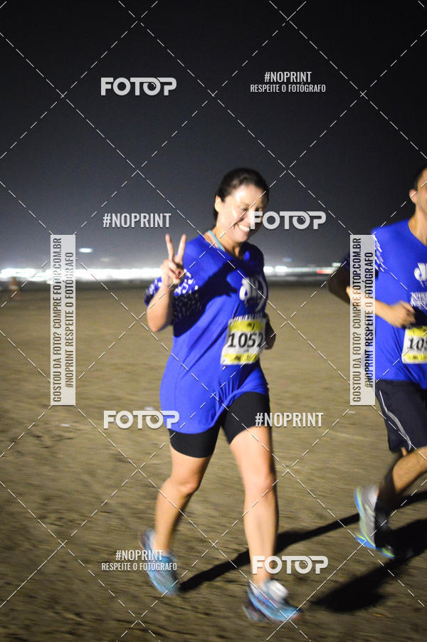 Buy your photos of the eventJovem Pan Night Run Santos on Fotop