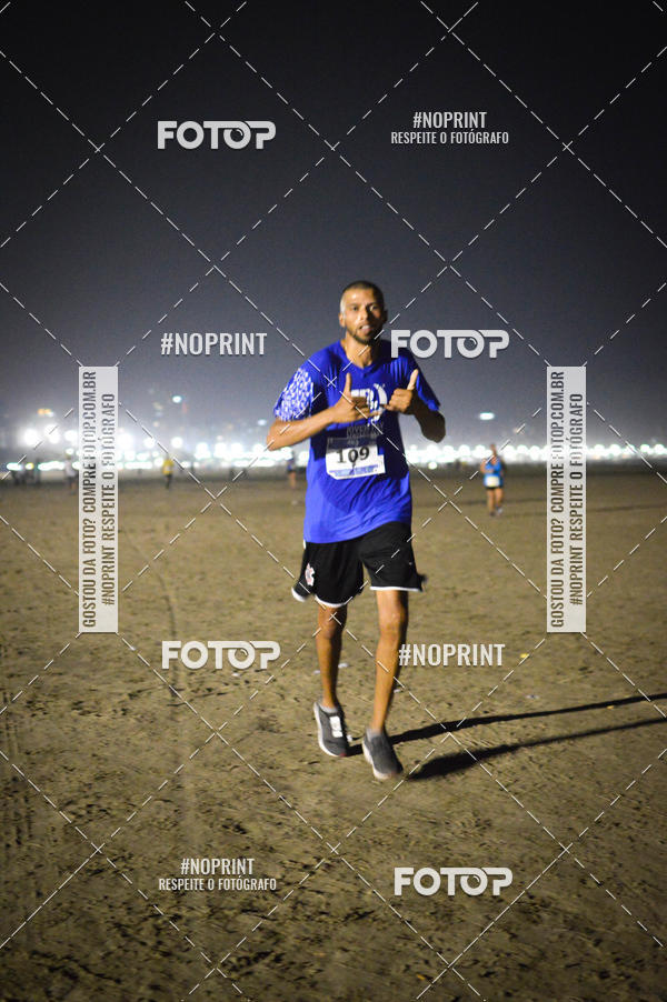 Buy your photos of the eventJovem Pan Night Run Santos on Fotop