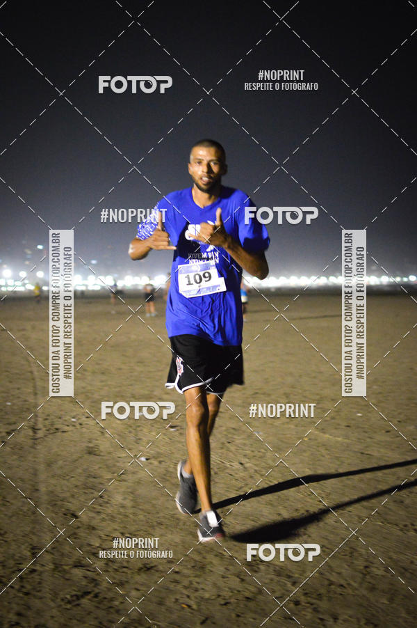 Buy your photos of the eventJovem Pan Night Run Santos on Fotop