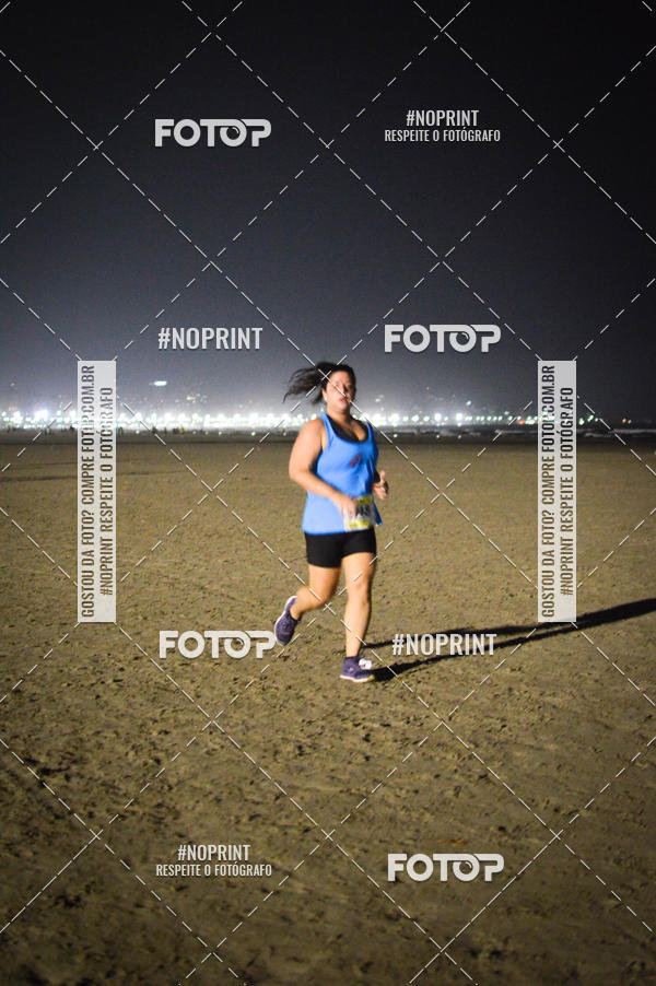 Buy your photos of the eventJovem Pan Night Run Santos on Fotop
