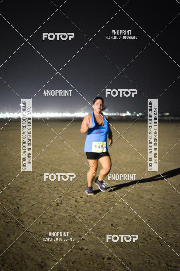 Buy your photos of the eventJovem Pan Night Run Santos on Fotop