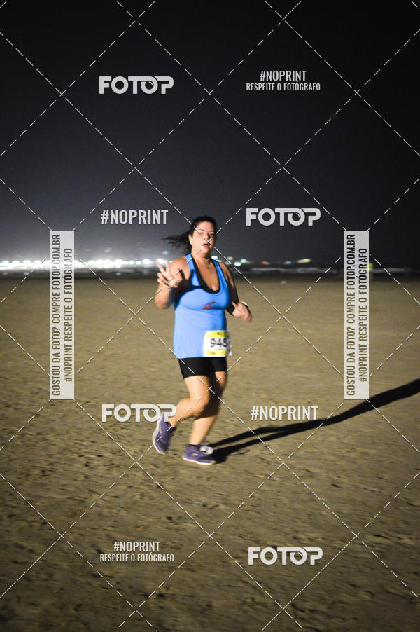 Buy your photos of the eventJovem Pan Night Run Santos on Fotop
