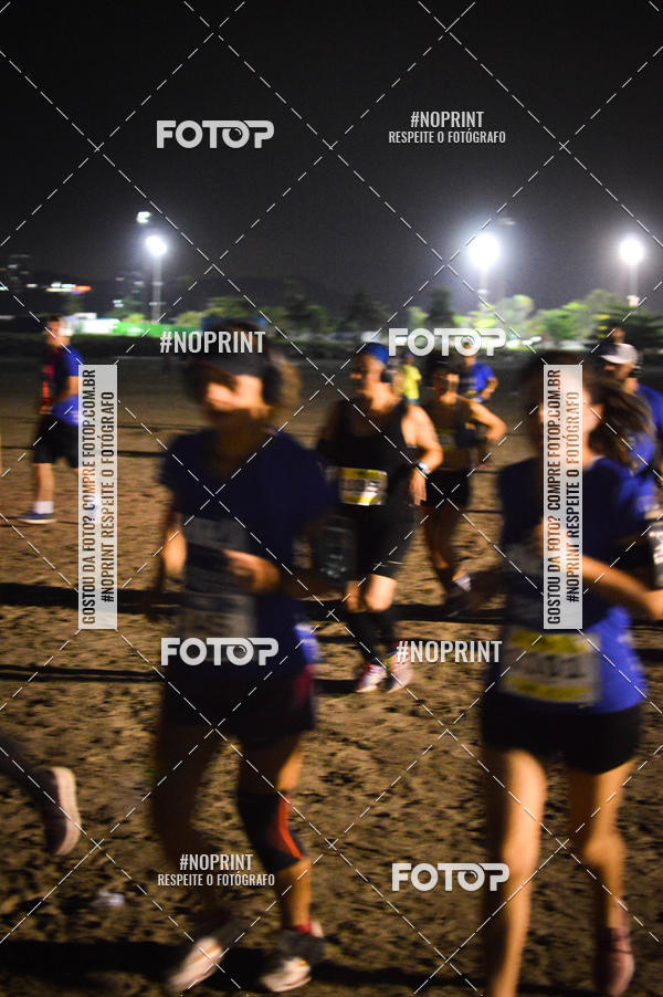 Buy your photos of the eventJovem Pan Night Run Santos on Fotop