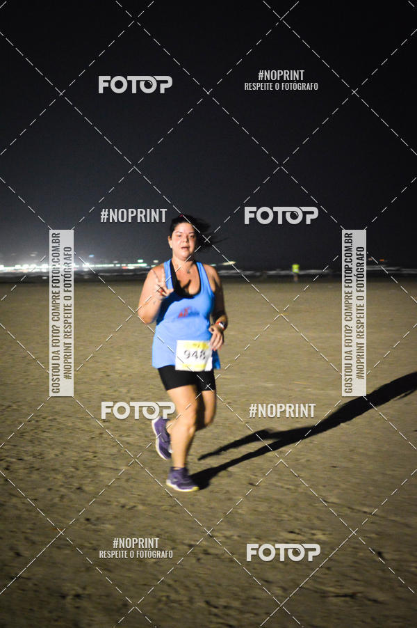 Buy your photos of the eventJovem Pan Night Run Santos on Fotop