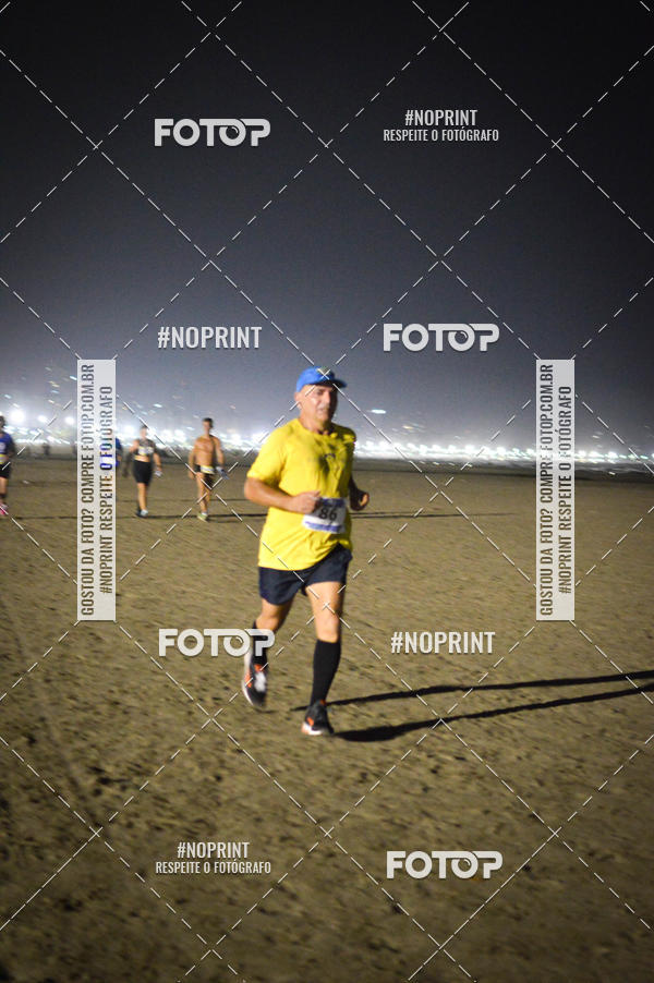 Buy your photos of the eventJovem Pan Night Run Santos on Fotop