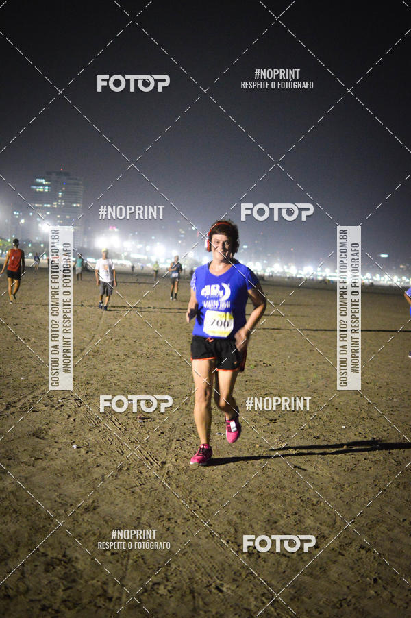 Buy your photos of the eventJovem Pan Night Run Santos on Fotop