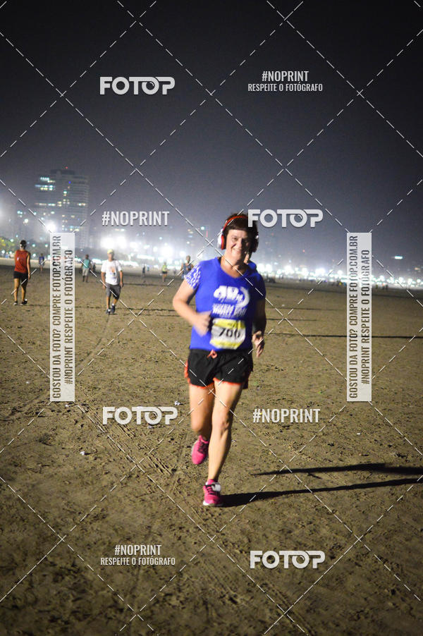 Buy your photos of the eventJovem Pan Night Run Santos on Fotop