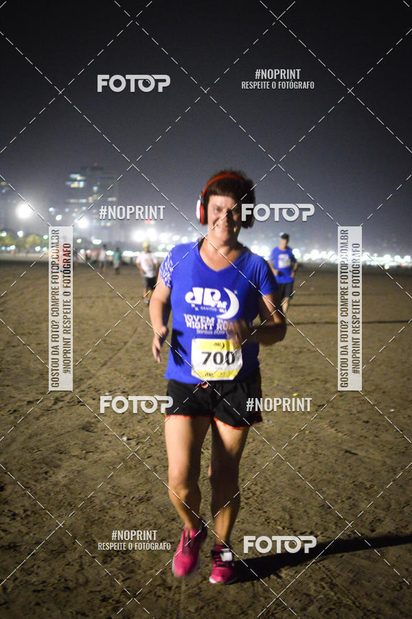 Buy your photos of the eventJovem Pan Night Run Santos on Fotop