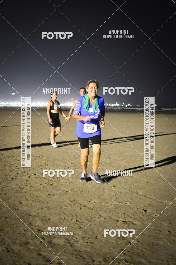 Buy your photos of the eventJovem Pan Night Run Santos on Fotop