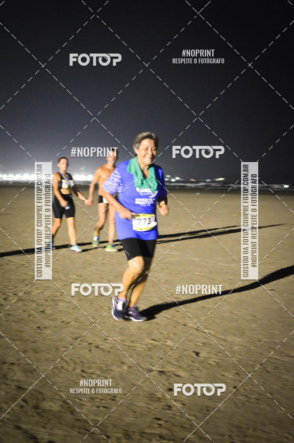 Buy your photos of the eventJovem Pan Night Run Santos on Fotop