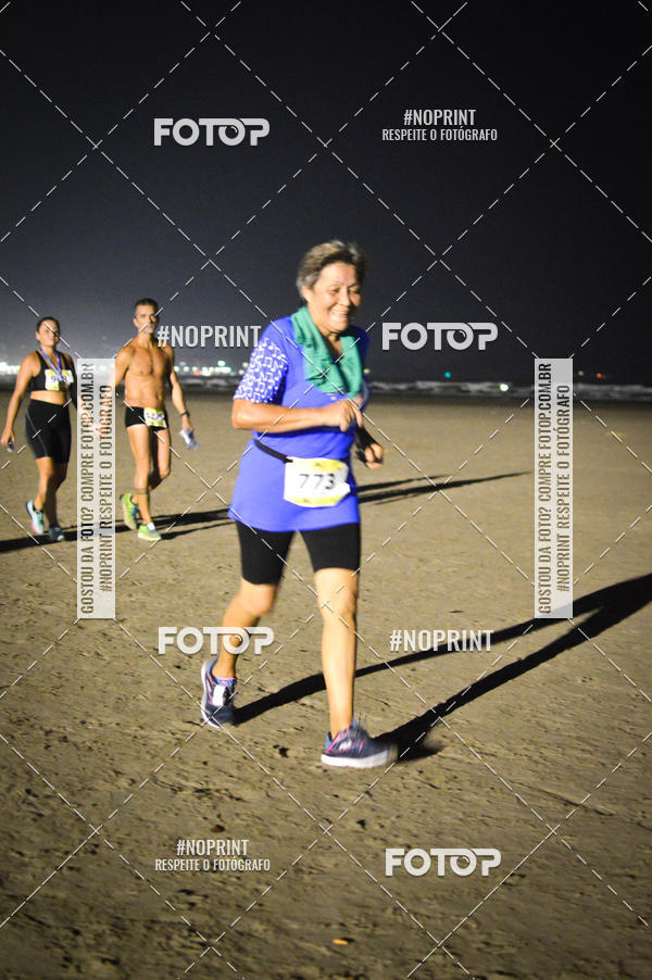 Buy your photos of the eventJovem Pan Night Run Santos on Fotop