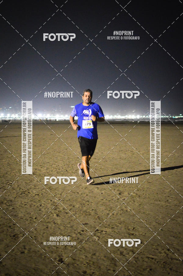 Buy your photos of the eventJovem Pan Night Run Santos on Fotop