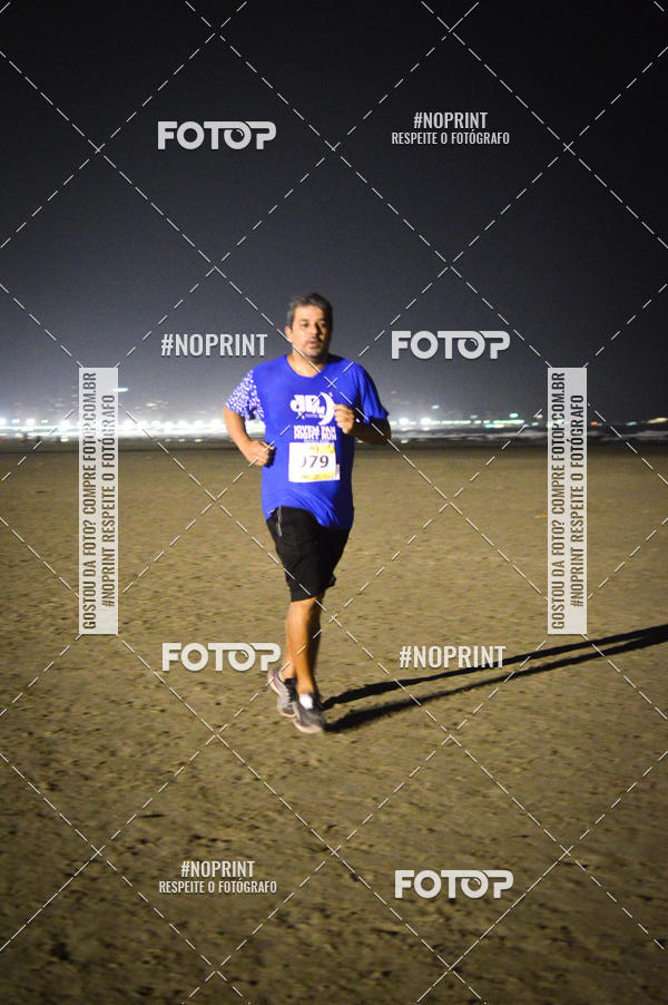Buy your photos of the eventJovem Pan Night Run Santos on Fotop