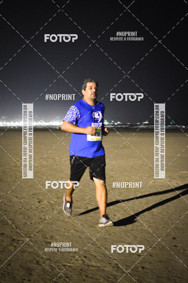 Buy your photos of the eventJovem Pan Night Run Santos on Fotop