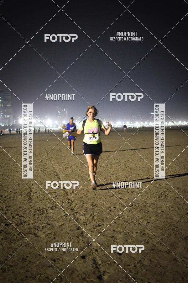 Buy your photos of the eventJovem Pan Night Run Santos on Fotop