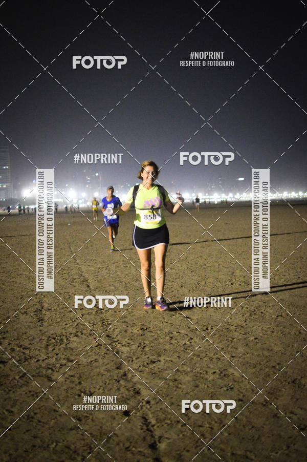 Buy your photos of the eventJovem Pan Night Run Santos on Fotop