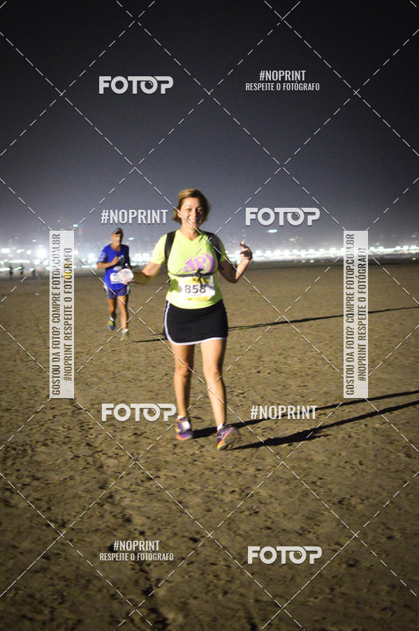 Buy your photos of the eventJovem Pan Night Run Santos on Fotop