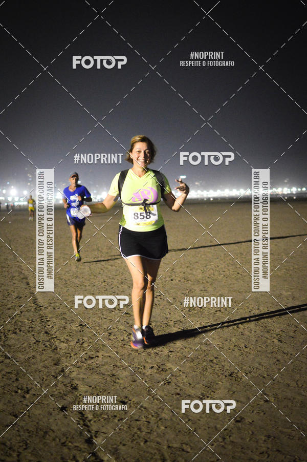 Buy your photos of the eventJovem Pan Night Run Santos on Fotop