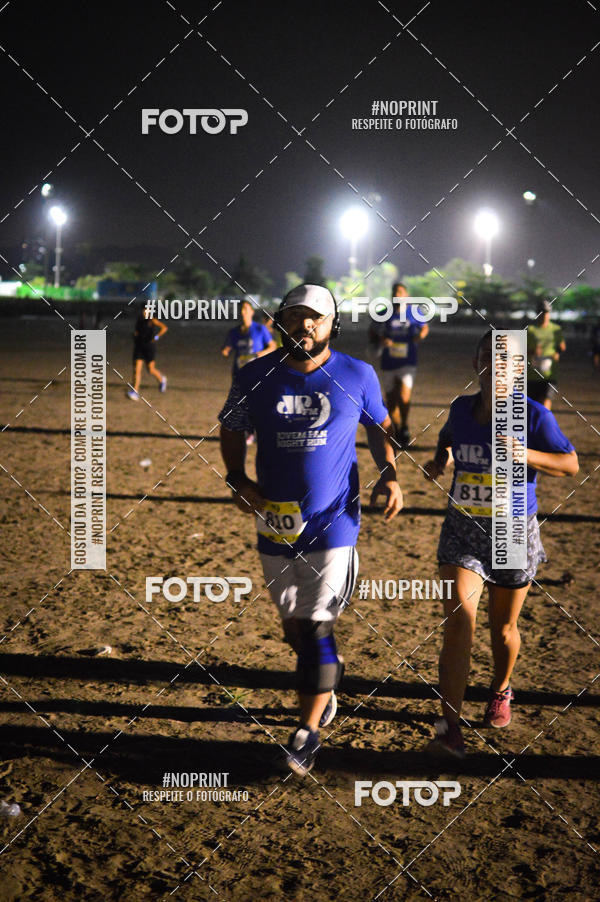 Buy your photos of the eventJovem Pan Night Run Santos on Fotop