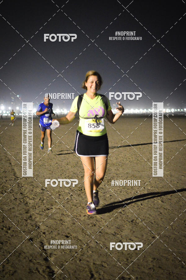 Buy your photos of the eventJovem Pan Night Run Santos on Fotop