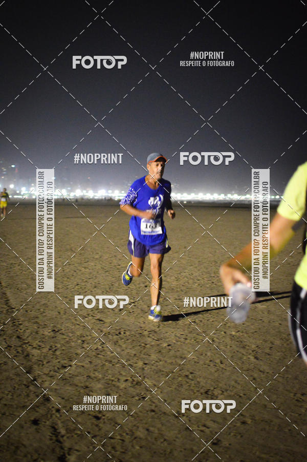 Buy your photos of the eventJovem Pan Night Run Santos on Fotop