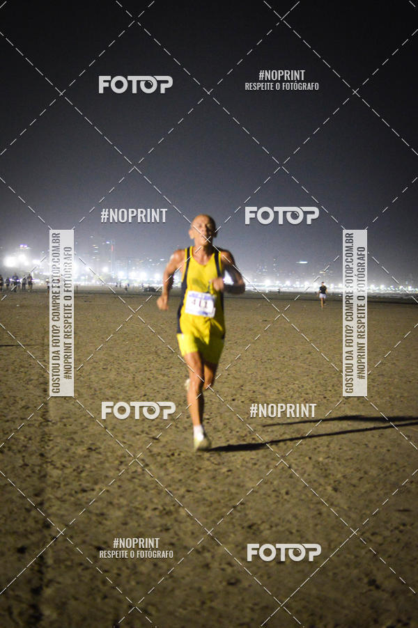 Buy your photos of the eventJovem Pan Night Run Santos on Fotop