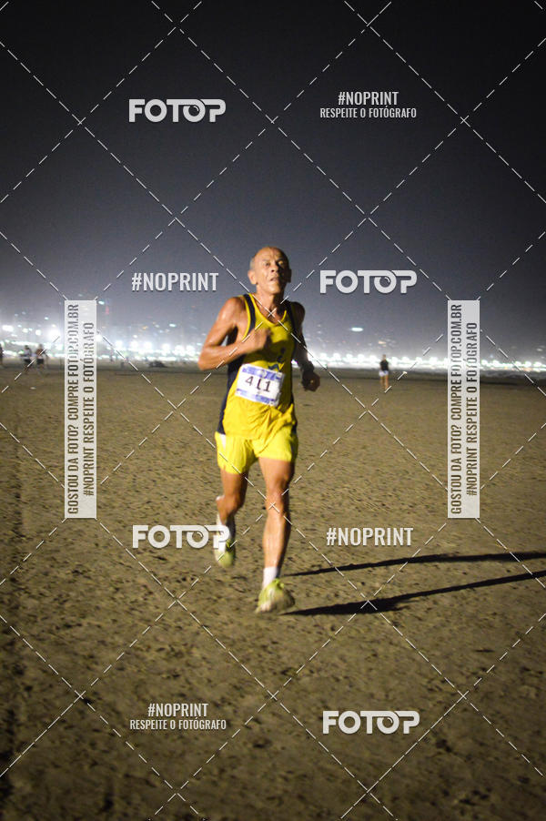 Buy your photos of the eventJovem Pan Night Run Santos on Fotop