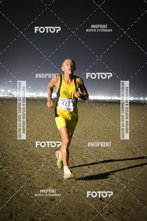 Buy your photos of the eventJovem Pan Night Run Santos on Fotop