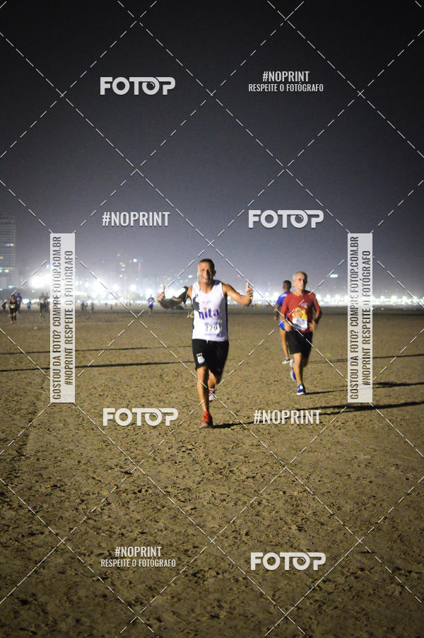 Buy your photos of the eventJovem Pan Night Run Santos on Fotop