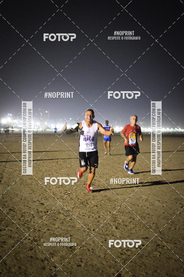 Buy your photos of the eventJovem Pan Night Run Santos on Fotop