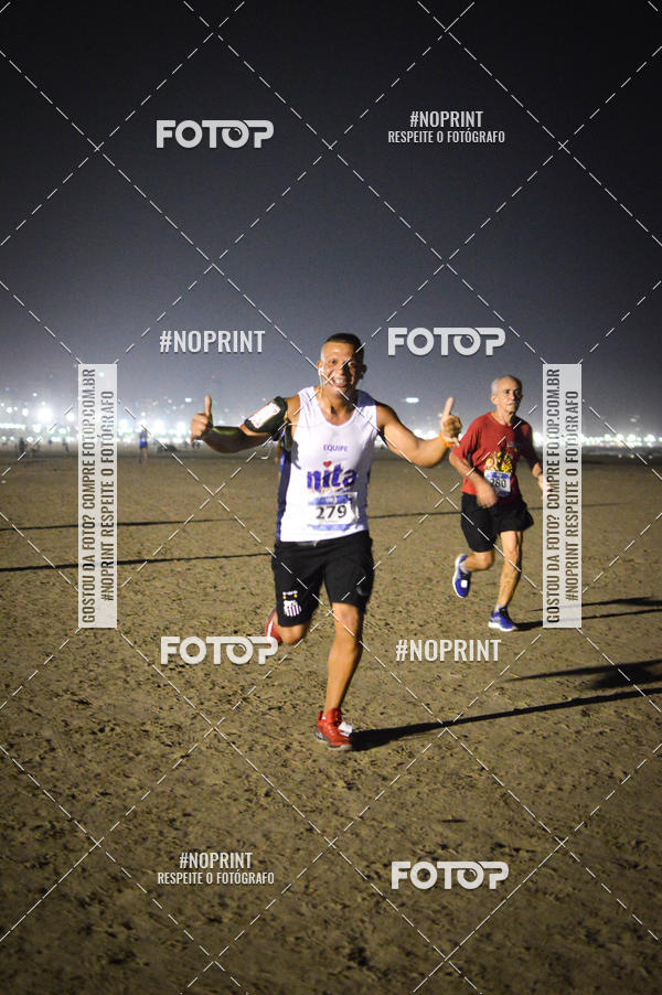 Buy your photos of the eventJovem Pan Night Run Santos on Fotop
