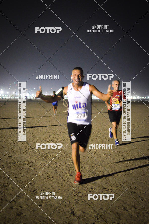 Buy your photos of the eventJovem Pan Night Run Santos on Fotop
