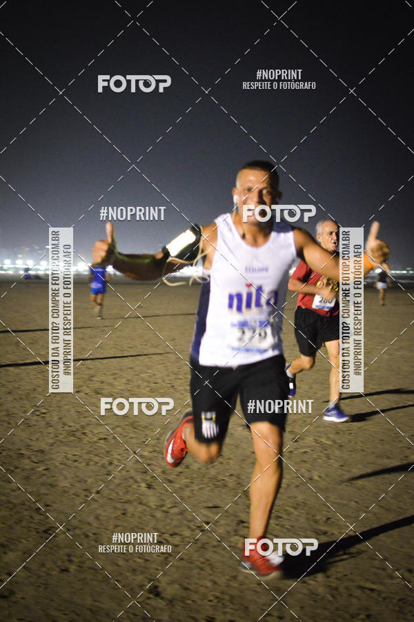 Buy your photos of the eventJovem Pan Night Run Santos on Fotop
