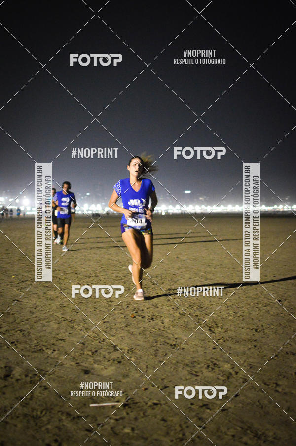 Buy your photos of the eventJovem Pan Night Run Santos on Fotop
