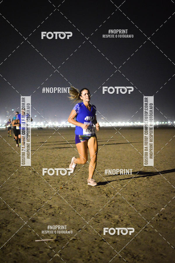 Buy your photos of the eventJovem Pan Night Run Santos on Fotop