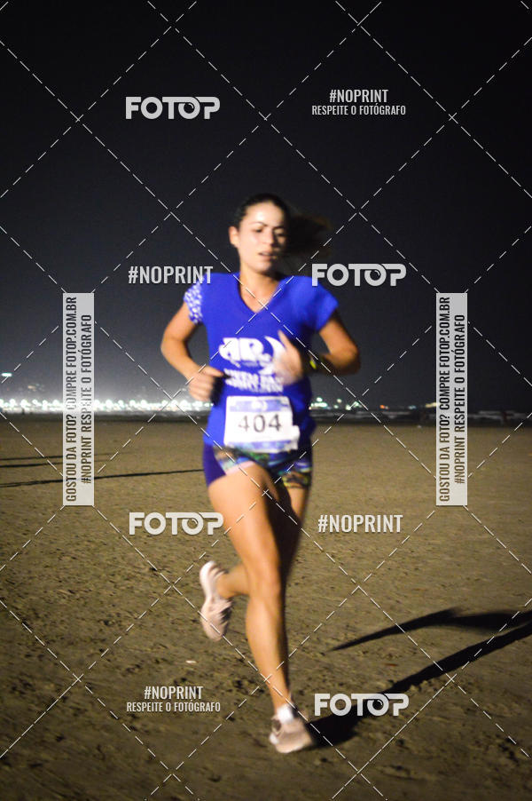 Buy your photos of the eventJovem Pan Night Run Santos on Fotop