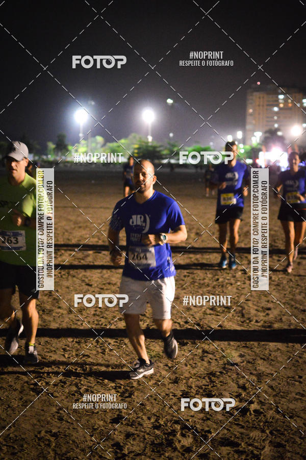 Buy your photos of the eventJovem Pan Night Run Santos on Fotop